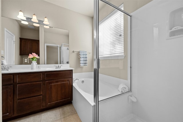 11000 Anderson Mill Rd Unit 100, Austin, TX 78750 - full bath with a shower stall, double vanity, a bath, and tile patterned floors