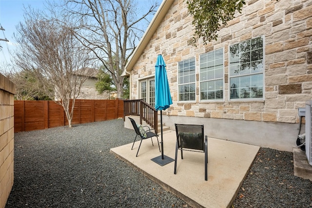 11000 Anderson Mill Rd Unit 100, Austin, TX 78750 - fenced backyard with a patio and french doors