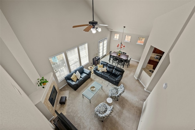 11000 Anderson Mill Rd Unit 100, Austin, TX 78750 - carpeted living area with a fireplace, high vaulted ceiling, healthy amount of natural light, and ceiling fan