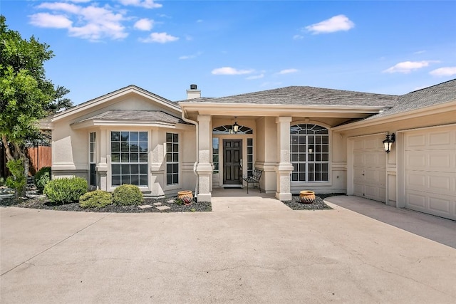 view of front of property with a garage