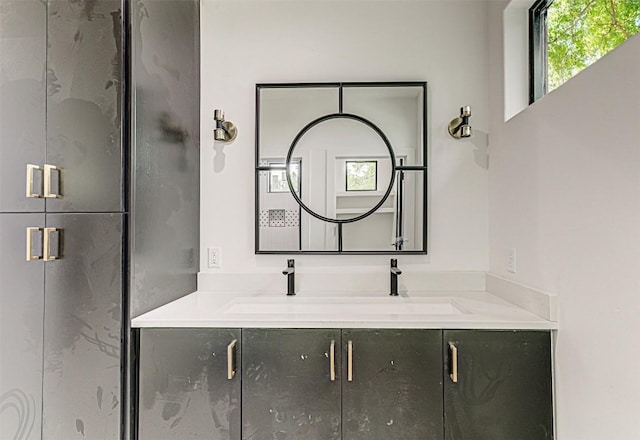1012 Impala Dr, Granite Shoals, TX 78654 - full bathroom featuring a sink, a stall shower, and double vanity