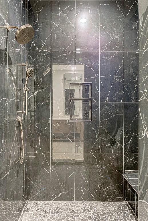 1012 Impala Dr, Granite Shoals, TX 78654 - full bath with a marble finish shower