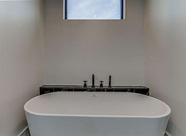 1012 Impala Dr, Granite Shoals, TX 78654 - bathroom featuring a soaking tub