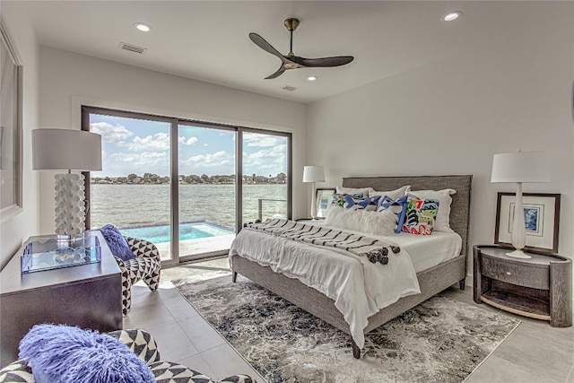 1012 Impala Dr, Granite Shoals, TX 78654 - bedroom featuring access to outside, tile patterned floors, recessed lighting, ceiling fan, and a water view