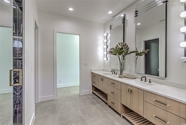 1012 Impala Dr, Granite Shoals, TX 78654 - bathroom with double vanity, recessed lighting, and tile patterned floors