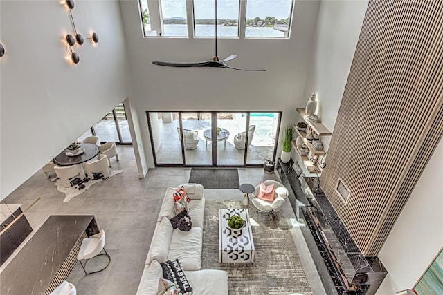 1012 Impala Dr, Granite Shoals, TX 78654 - living room with a high ceiling and ceiling fan