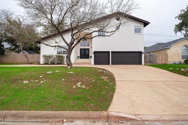 1302 Olympus Dr, Austin, TX 78733 - mediterranean / spanish-style home with concrete driveway, an attached garage, and stucco siding