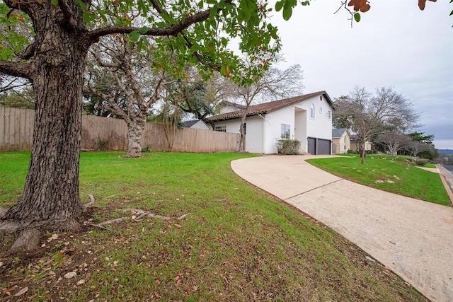 view of yard with a garage