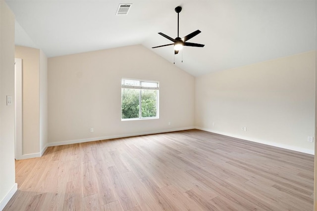 1302 Olympus Dr, Austin, TX 78733 - spare room featuring a ceiling fan, light wood-type flooring, vaulted ceiling, and baseboards
