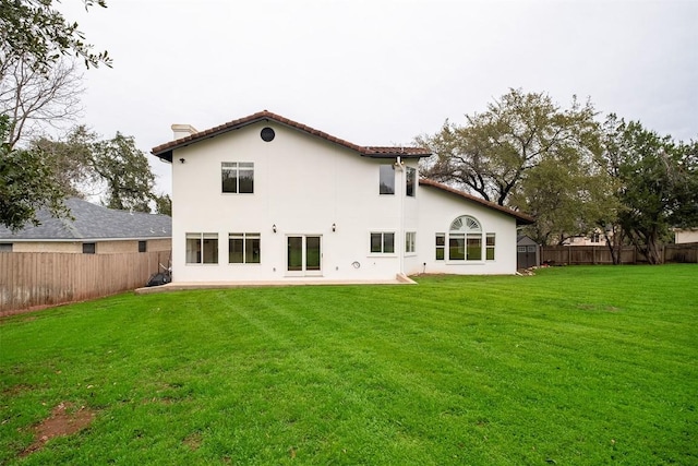 1302 Olympus Dr, Austin, TX 78733 - rear view of house with a chimney, stucco siding, and a patio