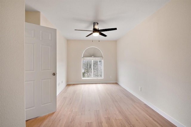 1302 Olympus Dr, Austin, TX 78733 - empty room with a ceiling fan, wood finished floors, and baseboards