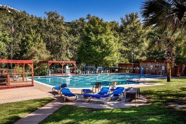 1302 Olympus Dr, Austin, TX 78733 - community pool featuring a patio area and a deck