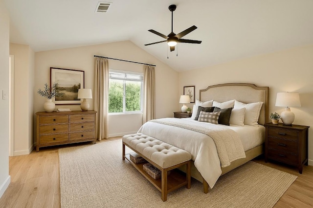 1302 Olympus Dr, Austin, TX 78733 - bedroom featuring light wood-style floors, baseboards, vaulted ceiling, and ceiling fan