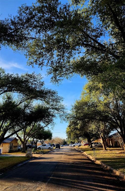 2000 Donna Dr, Taylor, TX 76574 - view of asphalt street featuring curbs