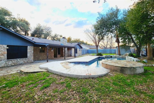 2000 Donna Dr, Taylor, TX 76574 - view of swimming pool with a hot tub, a patio, and a fenced backyard