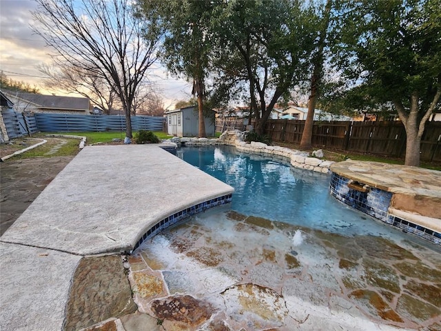 pool at dusk featuring a patio and a shed