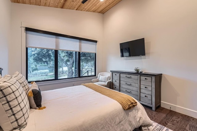 19217 Lost Tree Cv, Spicewood, TX 78669 - bedroom with dark wood-type flooring and wooden ceiling