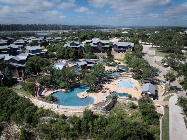 19217 Lost Tree Cv, Spicewood, TX 78669 - aerial overview of property's location with a pool area and nearby suburban area