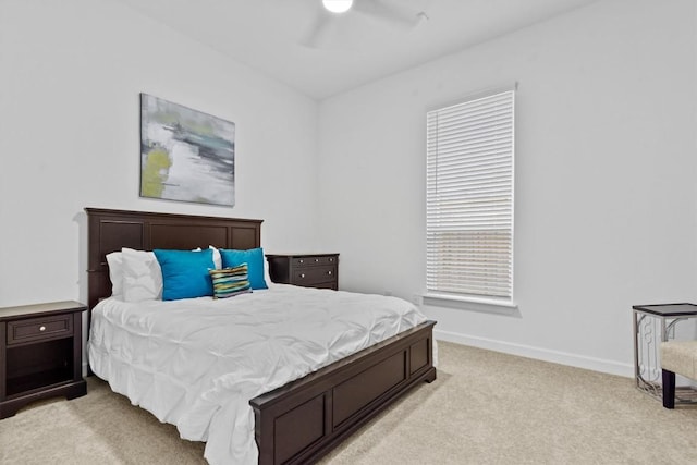 872 Wild Pecan Loop, Buda, TX 78610 - bedroom featuring light colored carpet, baseboards, and a ceiling fan