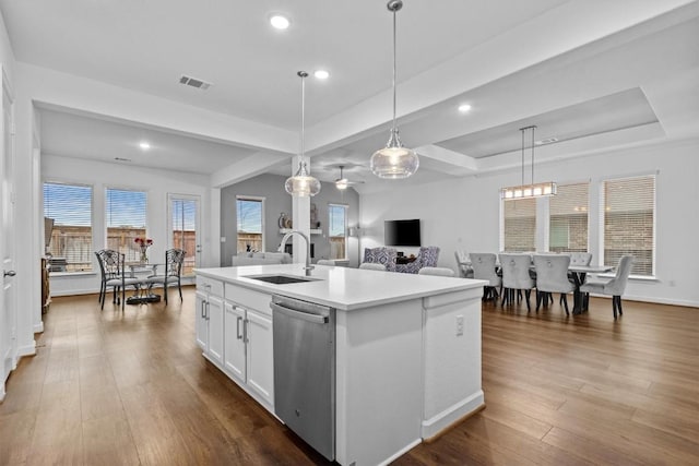 872 Wild Pecan Loop, Buda, TX 78610 - kitchen featuring dishwasher, a sink, white cabinetry, hanging light fixtures, and light countertops