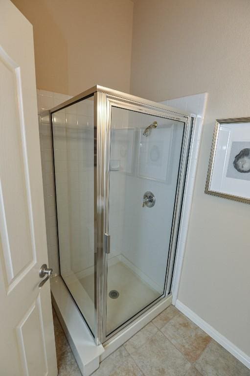 11409 Cezanne Ct, Austin, TX 78726 - bathroom featuring a shower stall and baseboards