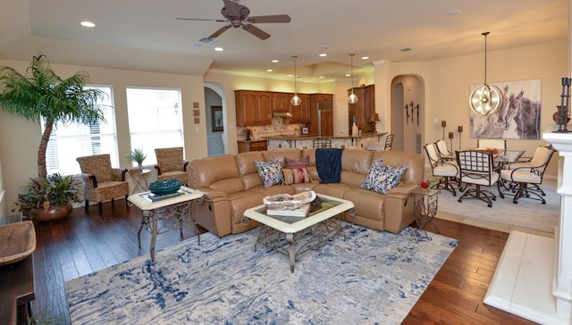11409 Cezanne Ct, Austin, TX 78726 - living room featuring arched walkways, wood-type flooring, a ceiling fan, and recessed lighting