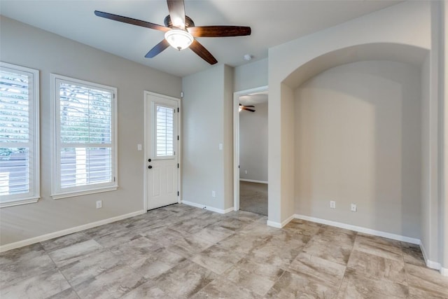 empty room with ceiling fan