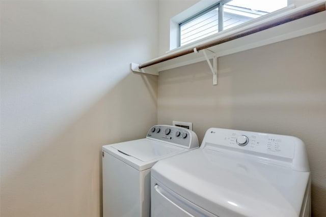 laundry area featuring separate washer and dryer