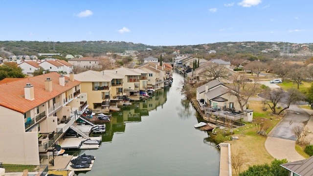 birds eye view of property featuring a water view