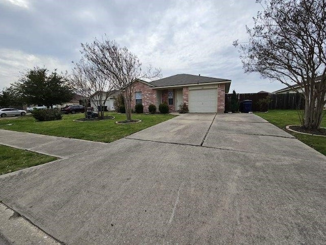 single story home with a garage and a front yard