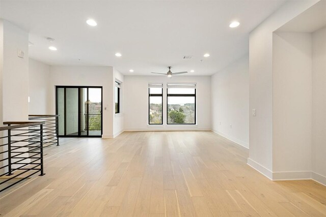 2050 Lohmans Spur Rd Unit 102, Lakeway, TX 78734 - unfurnished room with light wood-style flooring, recessed lighting, and a ceiling fan