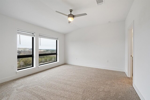 2050 Lohmans Spur Rd Unit 102, Lakeway, TX 78734 - unfurnished room with light colored carpet, a ceiling fan, and lofted ceiling