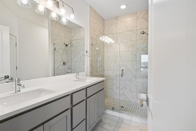 2050 Lohmans Spur Rd Unit 102, Lakeway, TX 78734 - full bath with marble finish floors, a stall shower, double vanity, and recessed lighting