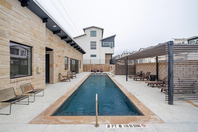 2050 Lohmans Spur Rd Unit 102, Lakeway, TX 78734 - community pool with a patio area