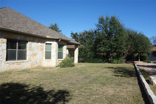 view of yard featuring fence