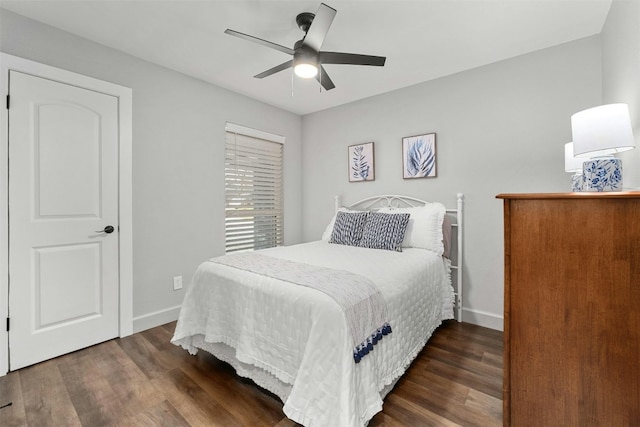 10113 Quail Hutch Dr, Austin, TX 78758 - bedroom featuring wood finished floors, baseboards, and a ceiling fan