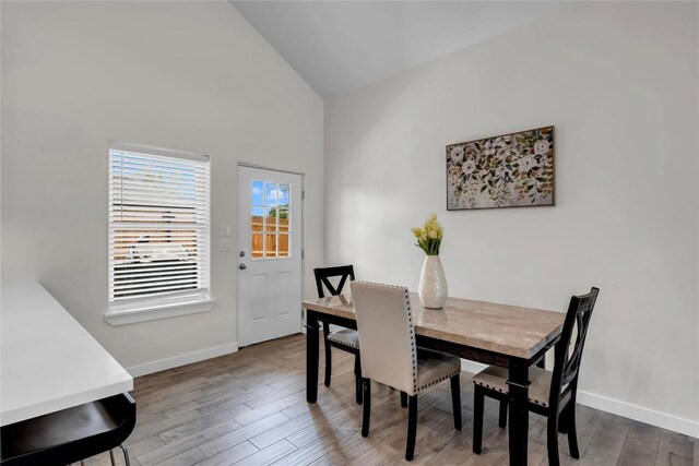 1514 Green Valley Ln, Granite Shoals, TX 78654 - dining room with wood finished floors and high vaulted ceiling