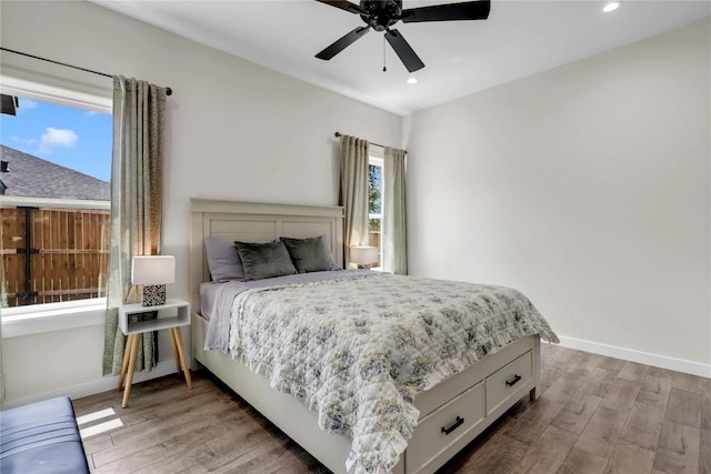 1514 Green Valley Ln, Granite Shoals, TX 78654 - bedroom featuring light wood-style flooring, recessed lighting, and a ceiling fan