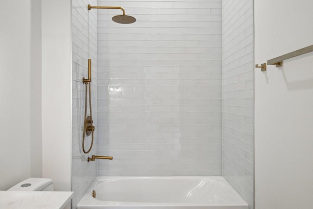 full bath featuring bathtub / shower combination and toilet