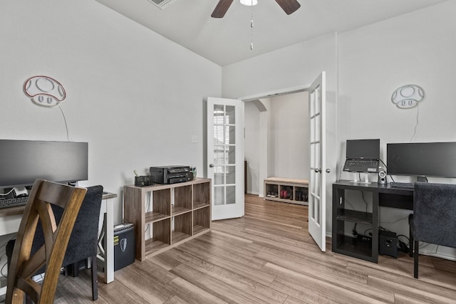 office area with light hardwood / wood-style flooring, ceiling fan, and french doors