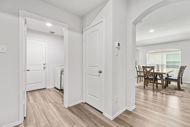hall featuring light wood-type flooring
