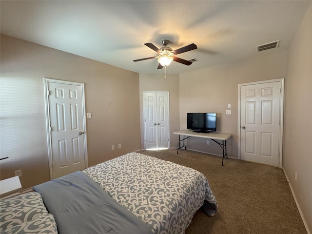 carpeted bedroom with ceiling fan