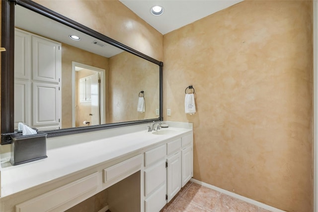bathroom featuring visible vents, baseboards, recessed lighting, vanity, and tile patterned flooring
