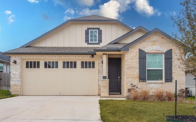 view of front of home with an attached garage, concrete driveway, board and batten siding, and stone siding