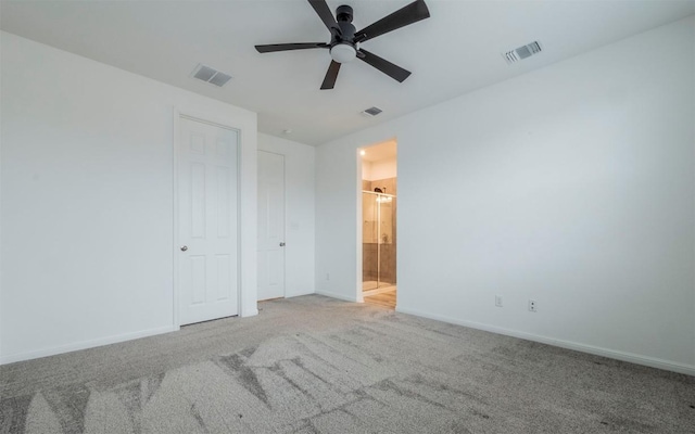 228 Citation Dr, Jarrell, TX 76537 - unfurnished bedroom featuring carpet flooring, baseboards, ensuite bath, and ceiling fan