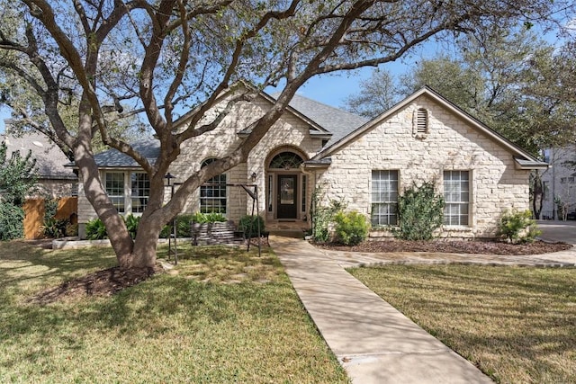 view of front of home with a front yard