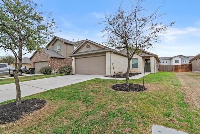 view of front of property featuring a garage, concrete driveway, a front yard, and fence