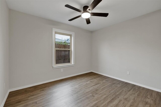 902 W Mill St, New Braunfels, TX 78130 - unfurnished room with ceiling fan and wood-type flooring