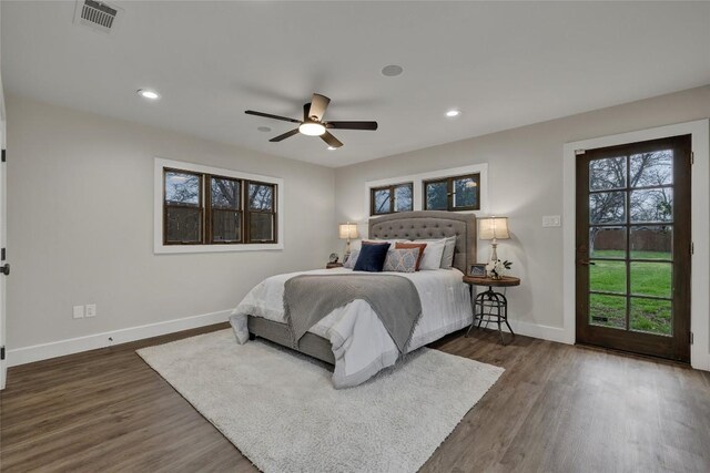902 W Mill St, New Braunfels, TX 78130 - bedroom with access to outside, dark hardwood / wood-style floors, and ceiling fan