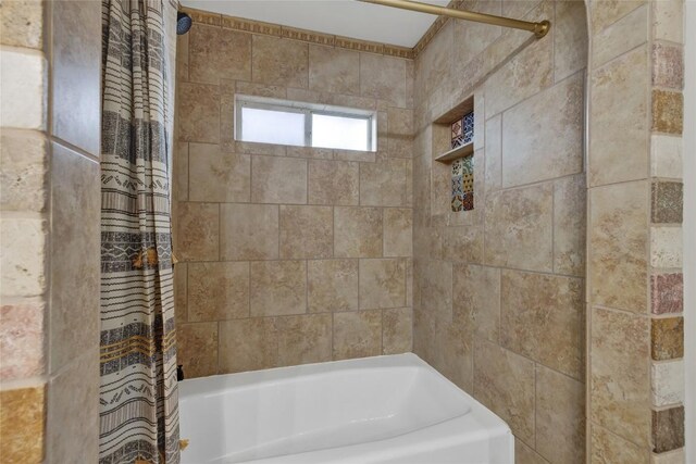 902 W Mill St, New Braunfels, TX 78130 - bathroom with shower / tub combo with curtain